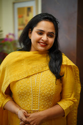 Stitched 3 piece chanderi salwar suit : Mustard and pear yoke