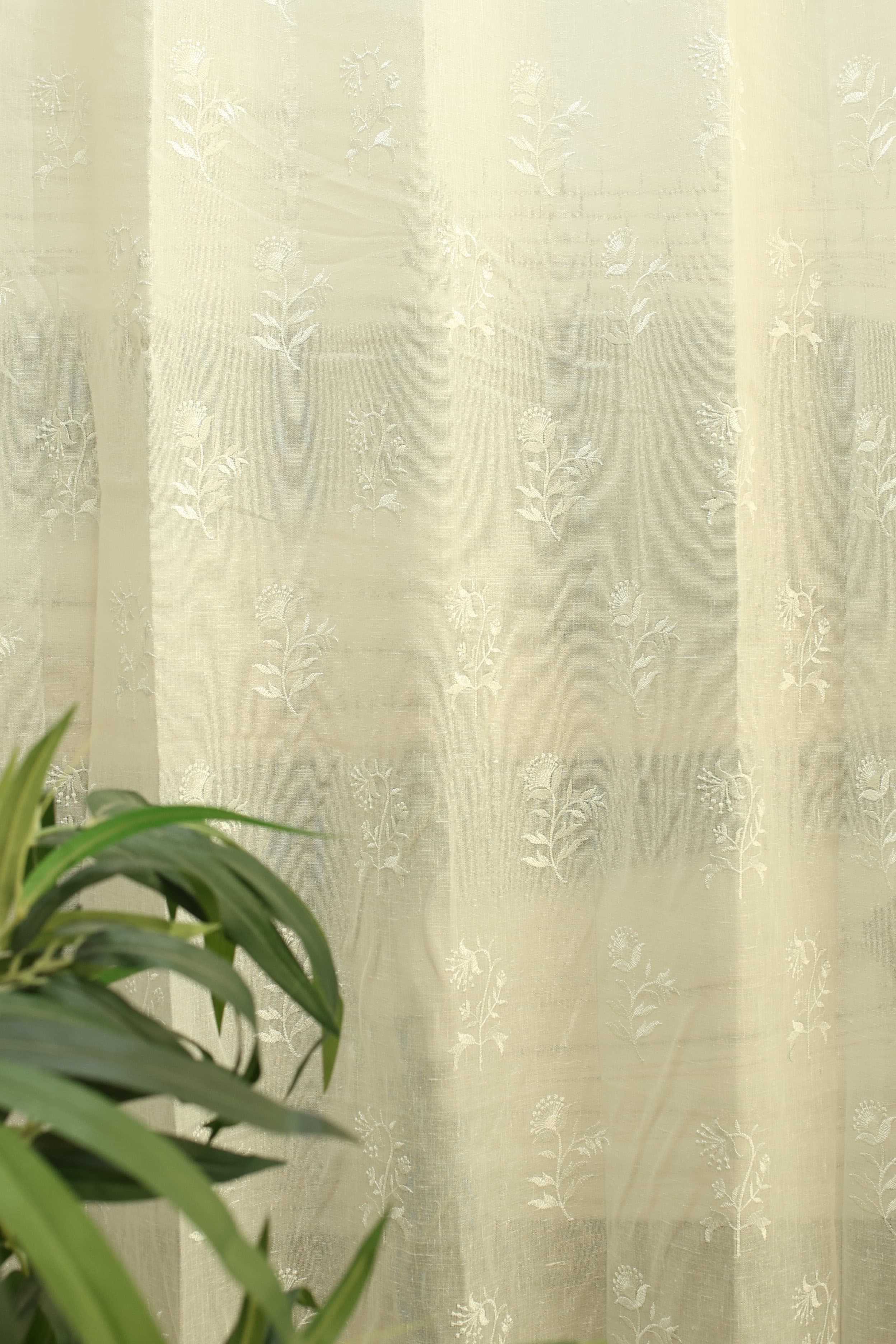Curtains -Premium embroidered sheer curtain white colour (lightening difference )