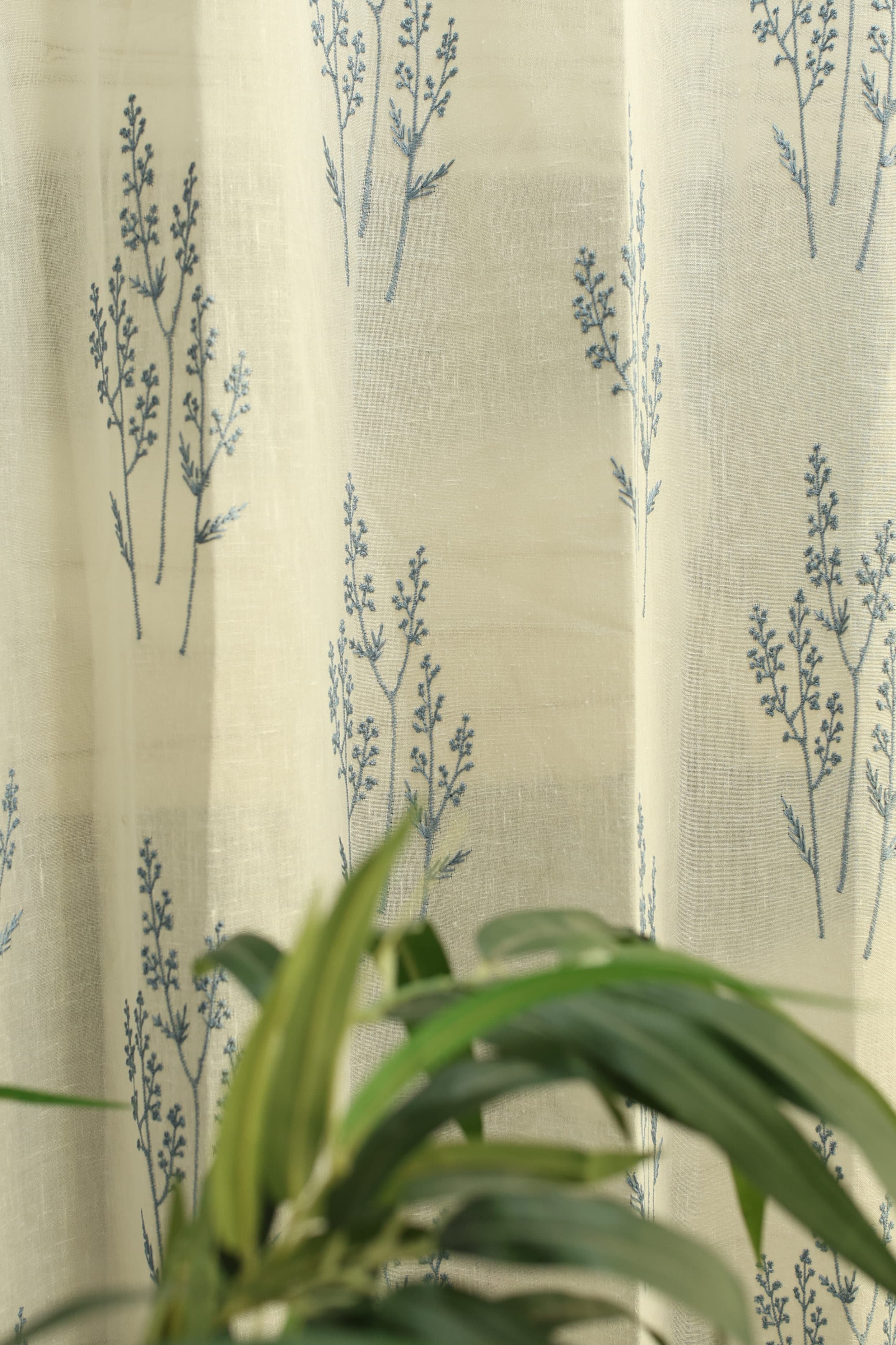 Curtains -Premium embroidered sheer curtain white colour (lightening difference )