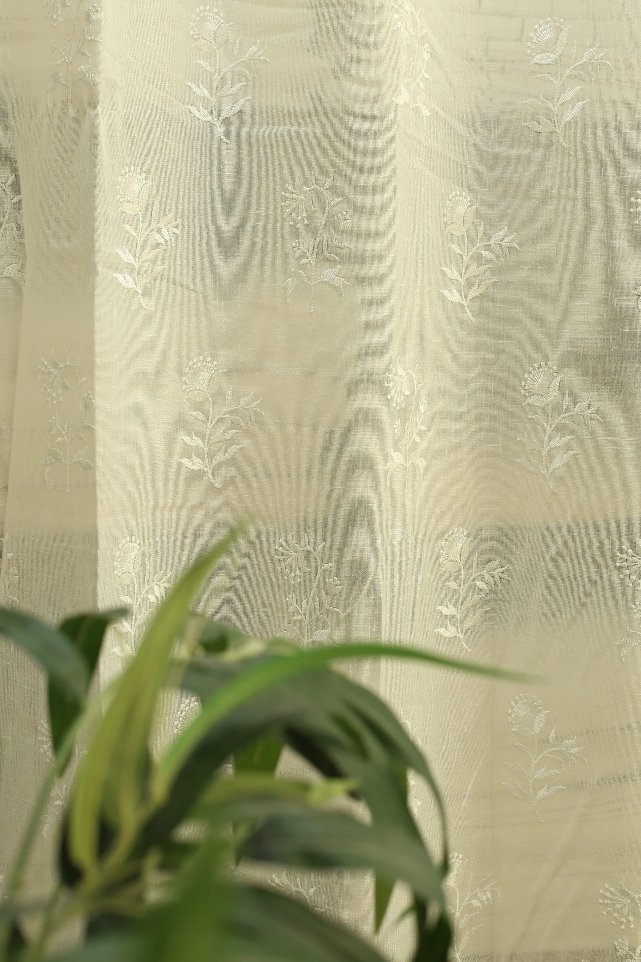 Curtains -Premium embroidered sheer curtain white colour (lightening difference )
