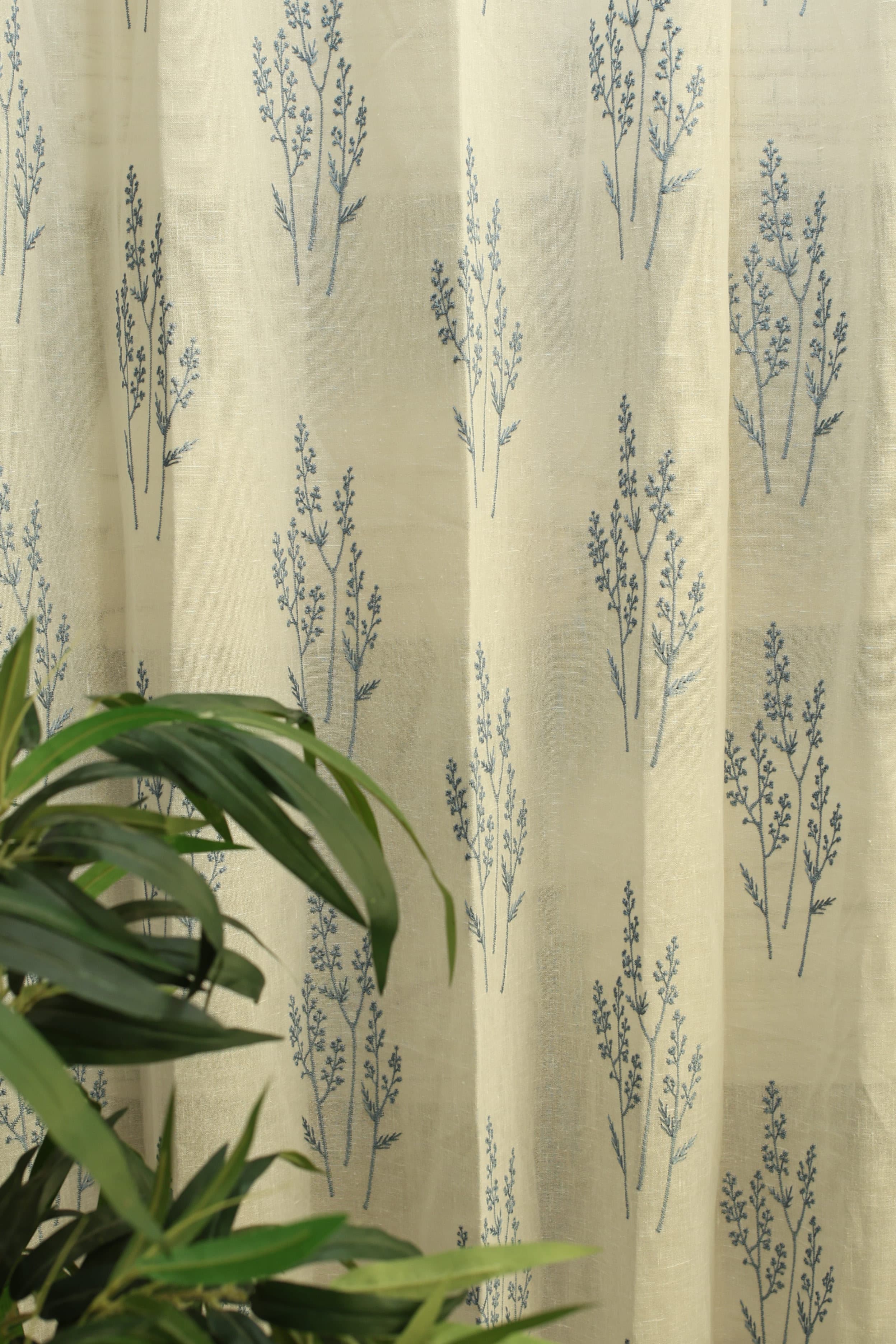 Curtains -Premium embroidered sheer curtain white colour (lightening difference )