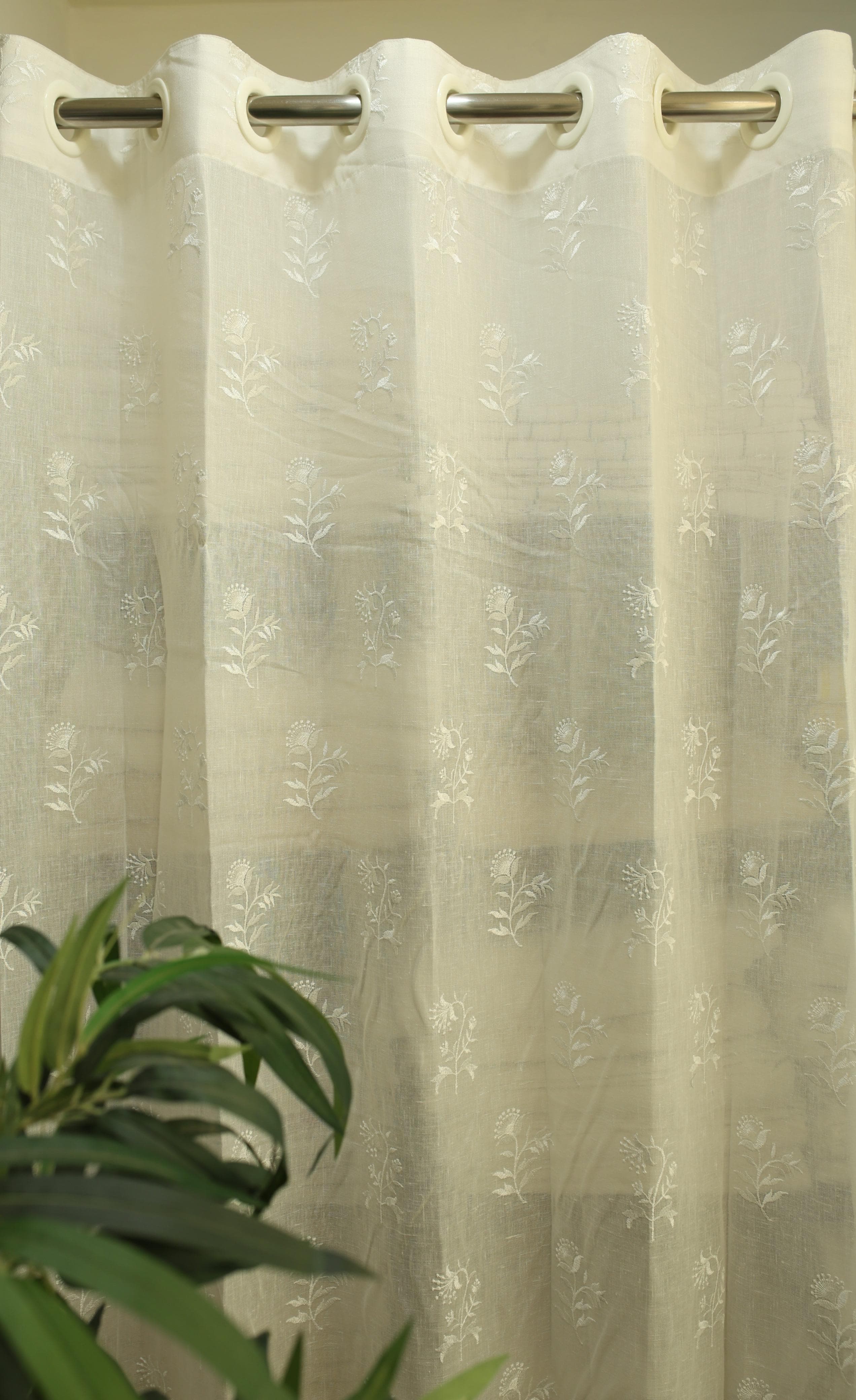 Curtains -Premium embroidered sheer curtain white colour (lightening difference )